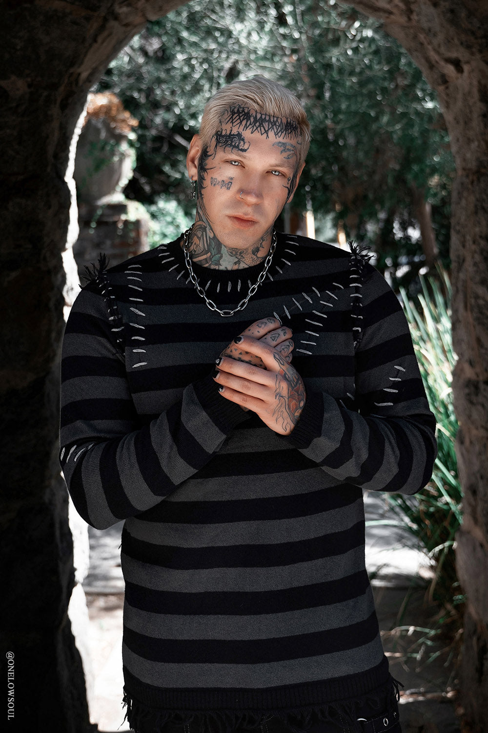 stitched-up emo sweater