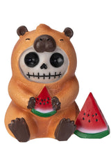 Skeleton capybara figurine holding a watermelon on a white background