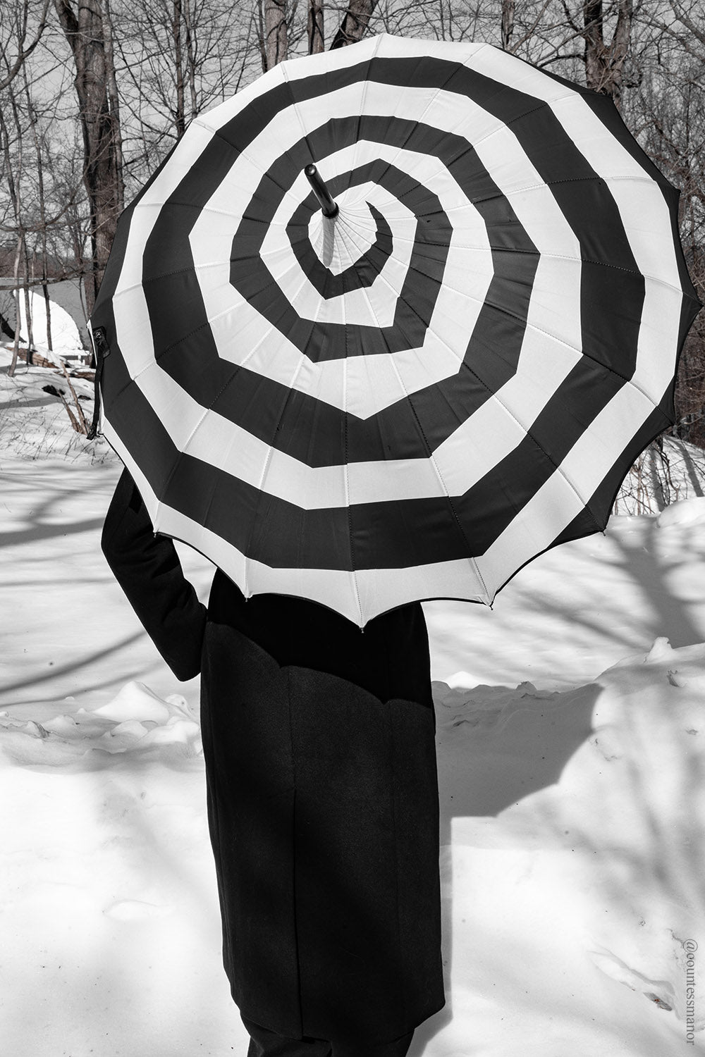 black and white striped Wednesday addams inspired umbrella 