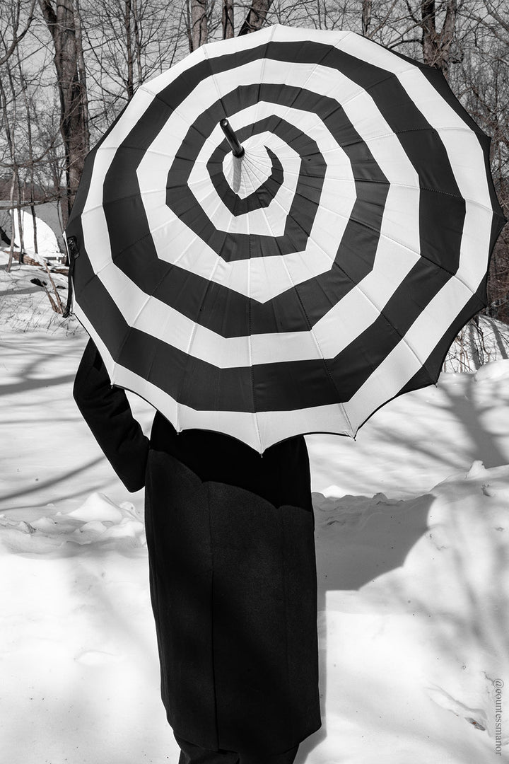 black and white striped Wednesday addams inspired umbrella 