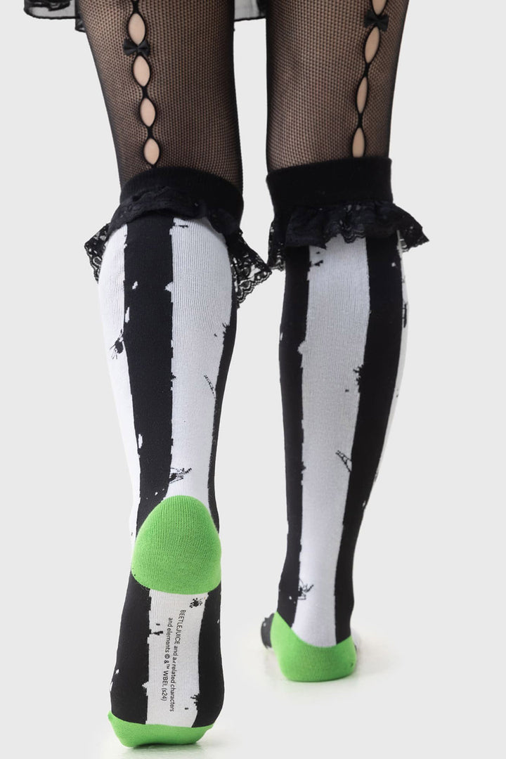 striped knee-high beetlejuice socks  by killsatar