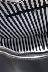 black and white interior inside lining of a moth backpack