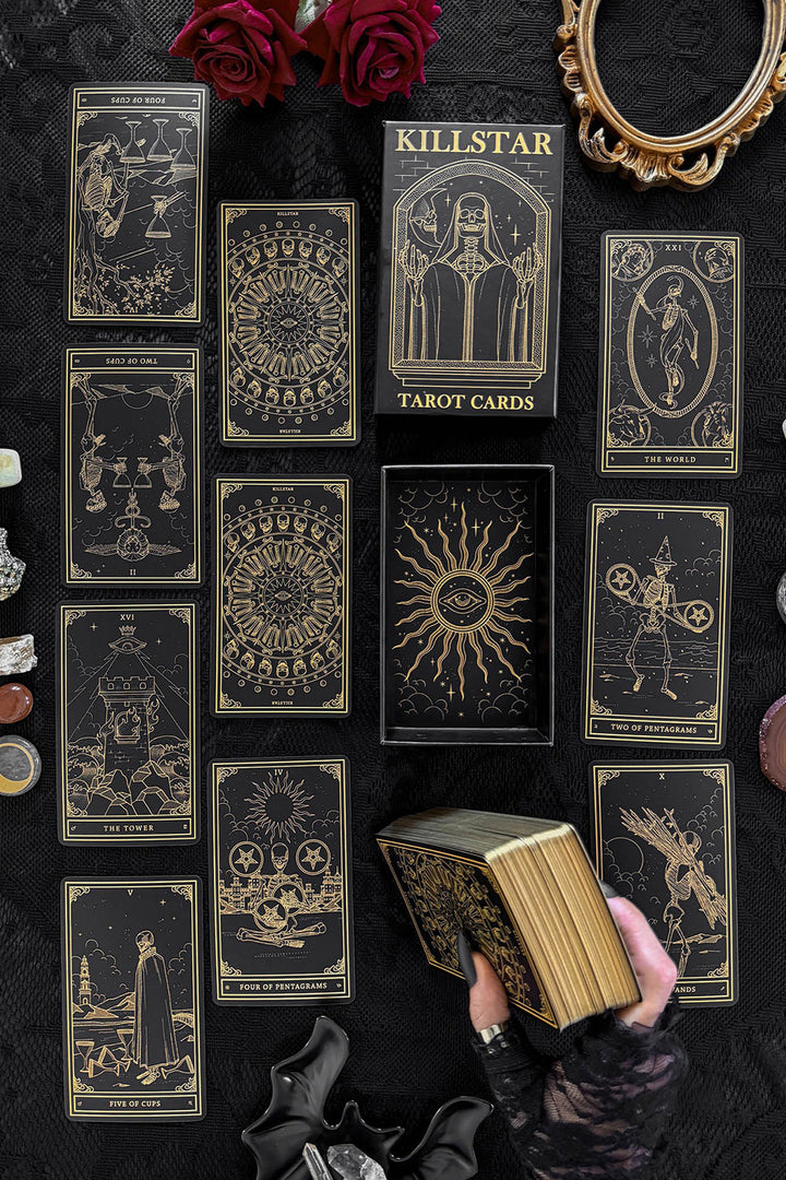 black and gold occult tarot card deck