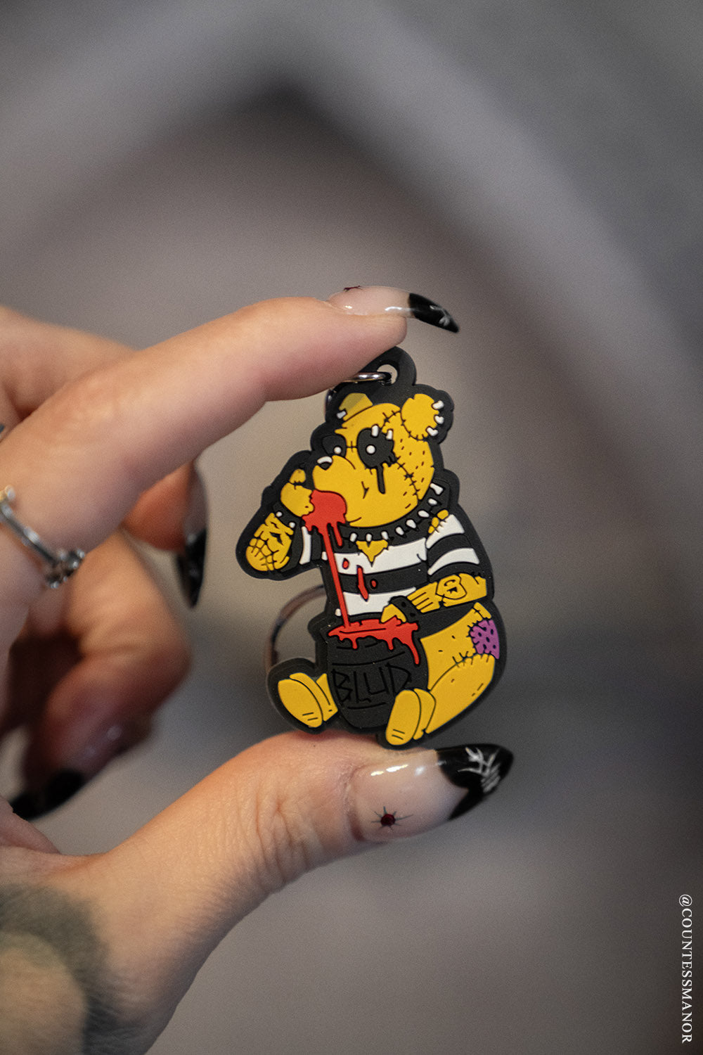 punk rock winnie the pooh keychain