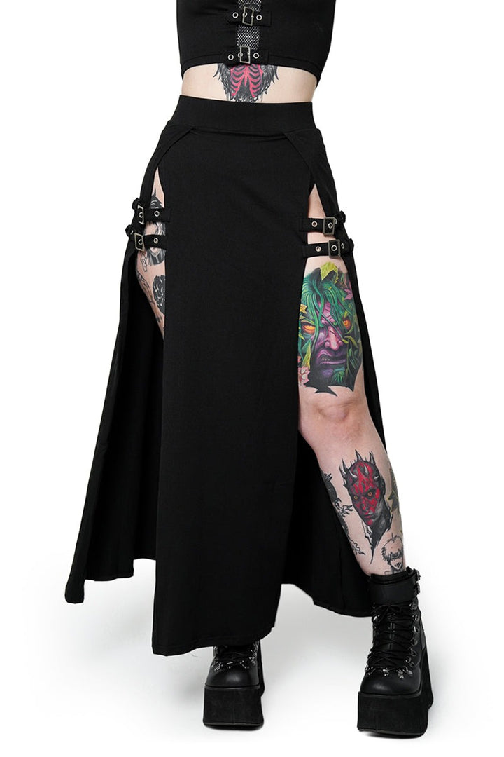 Black skirt with cut-out sides and tattoos on a white background