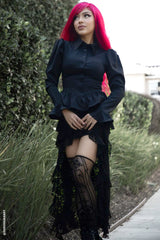 gothic woman wearing victorian flocked gothic cathedral thigh highs