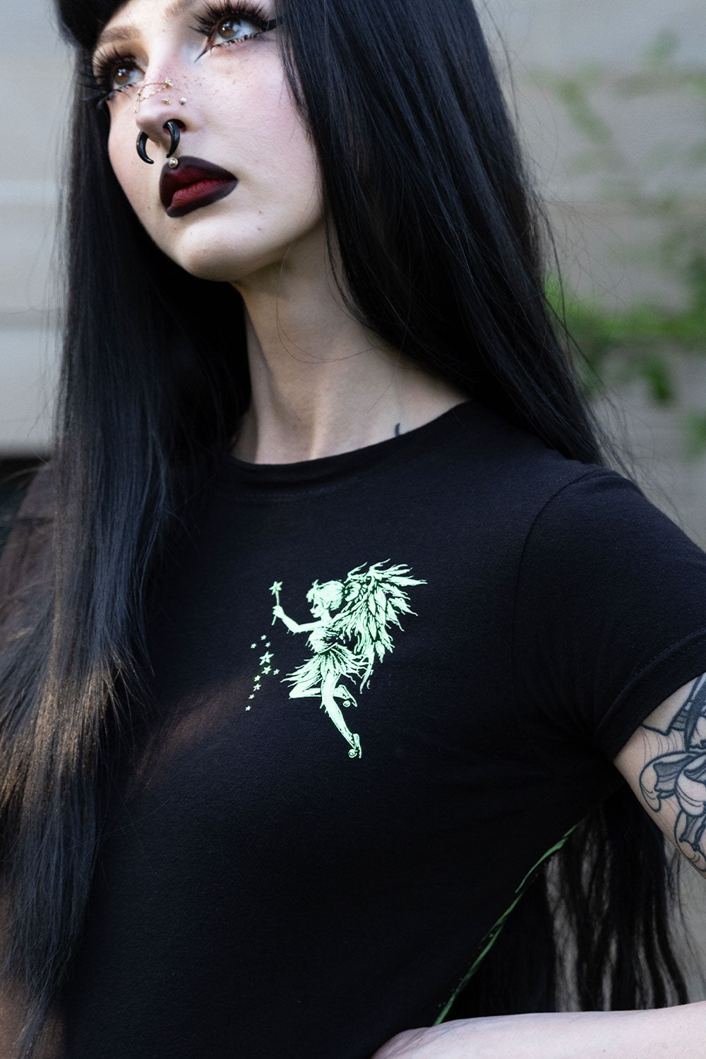 Black cotton shirt with green fairy graphic