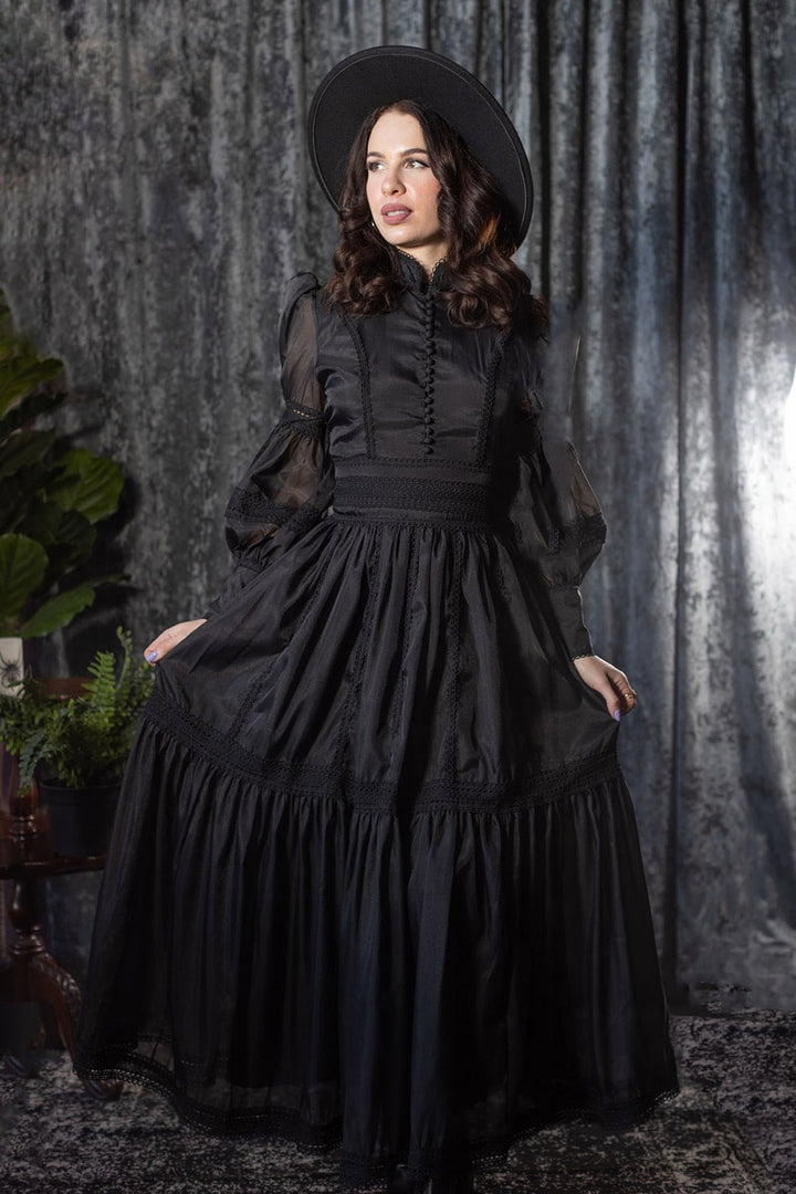 embroidered long woman in black gothic dress