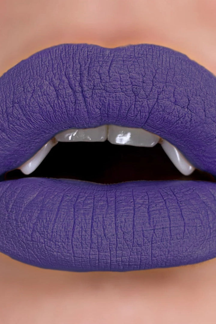 dark purple lipstick by curst kosmetics