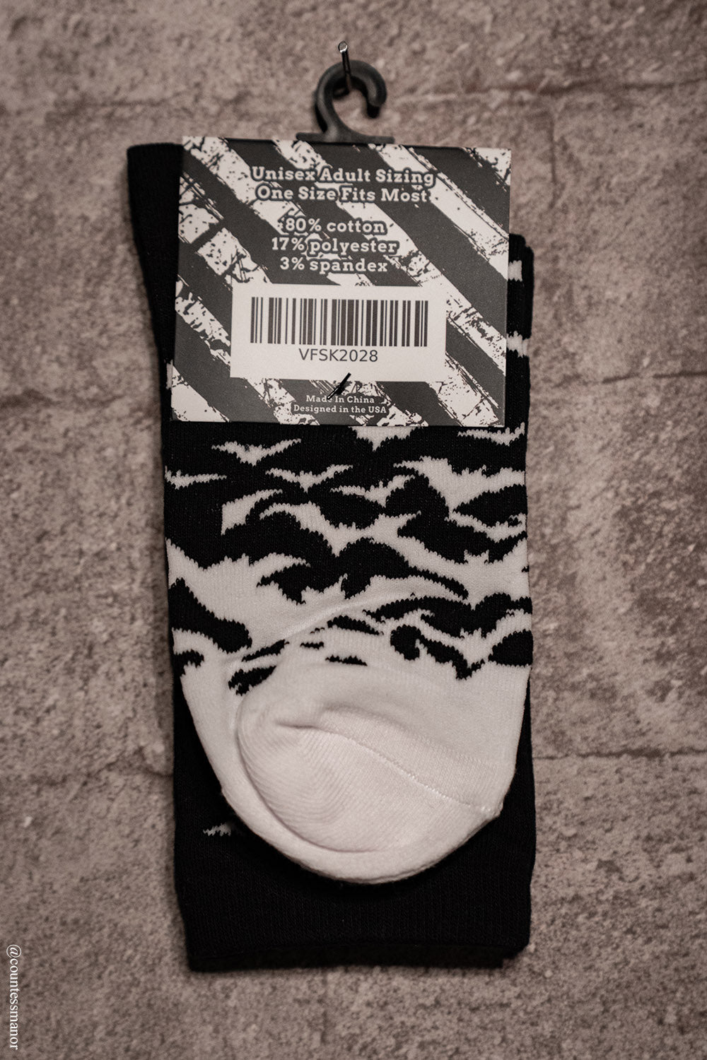 white and black gradient knitted bat socks