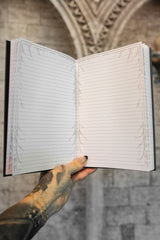 gothic spiderweb pages in a diary 