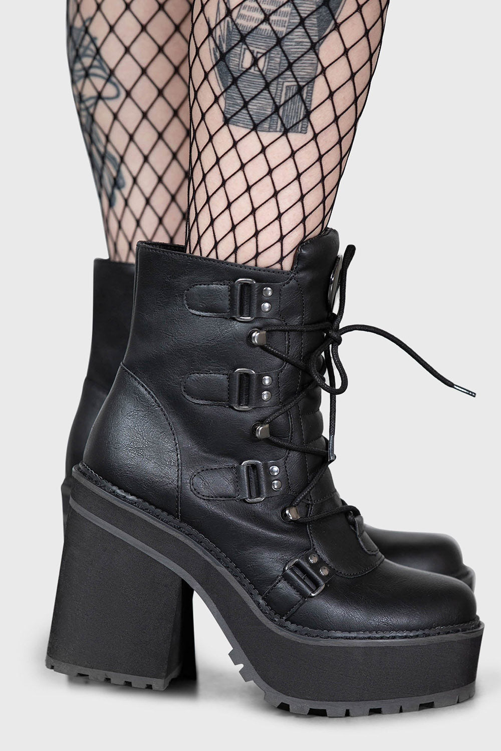 womens black vegan leather platform boots with crescent moon charms by killstar