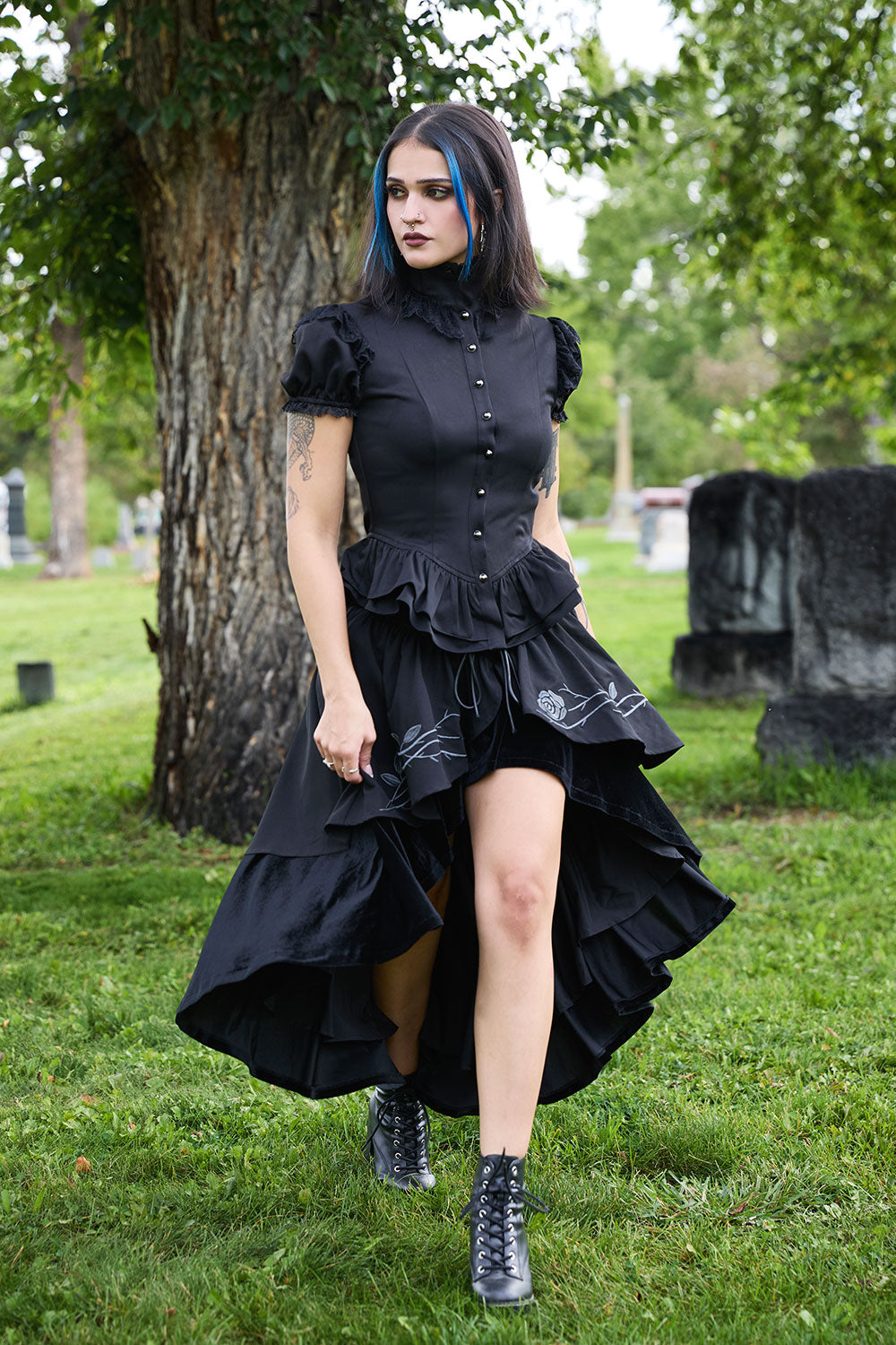 Womens black puff sleeve button down top with ruffle neck and waist