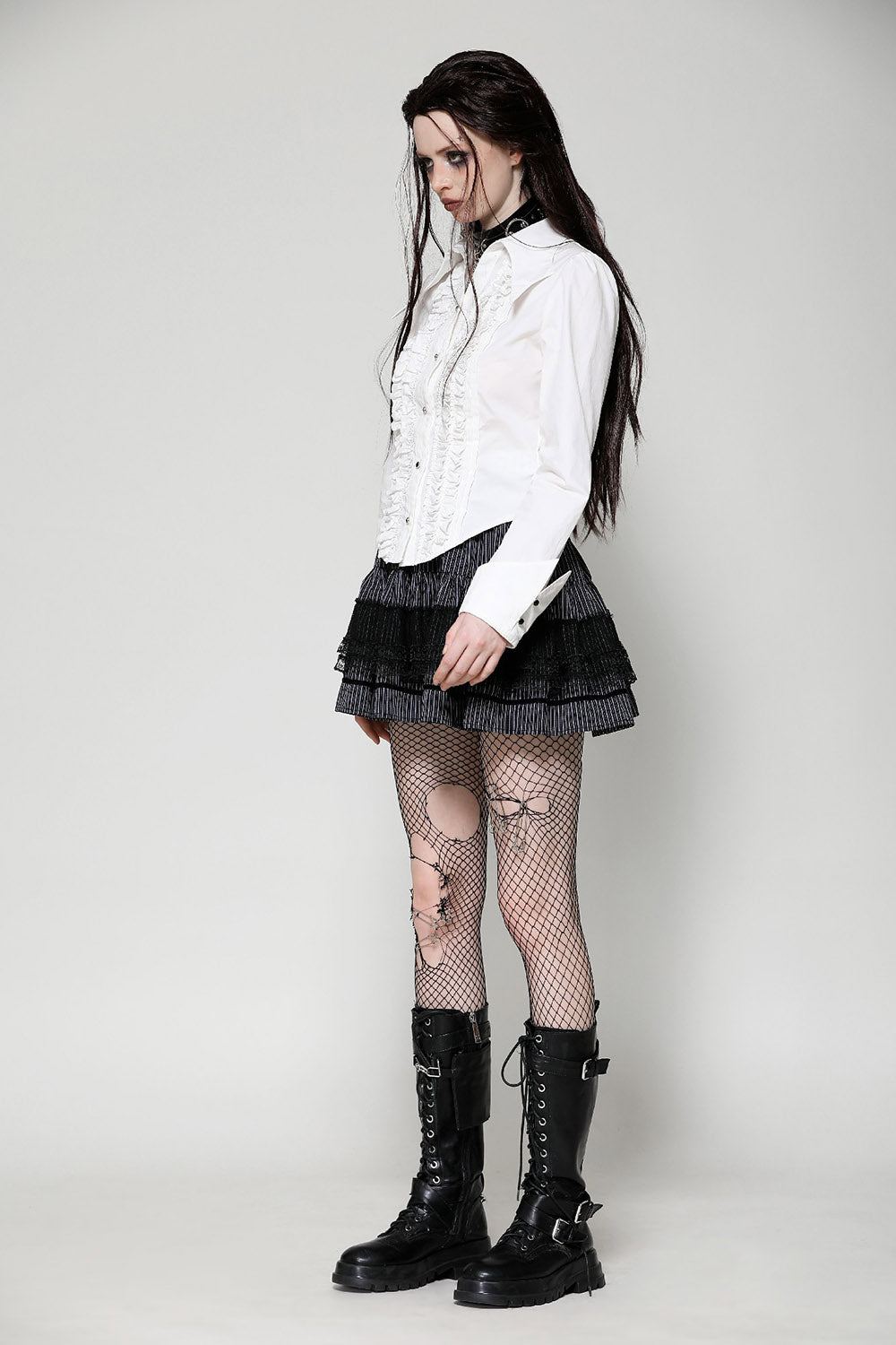 womens vintage-inspired white ruffled long sleeve button-up shirt with black buttons