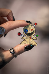 pincushion doll enamel pin 