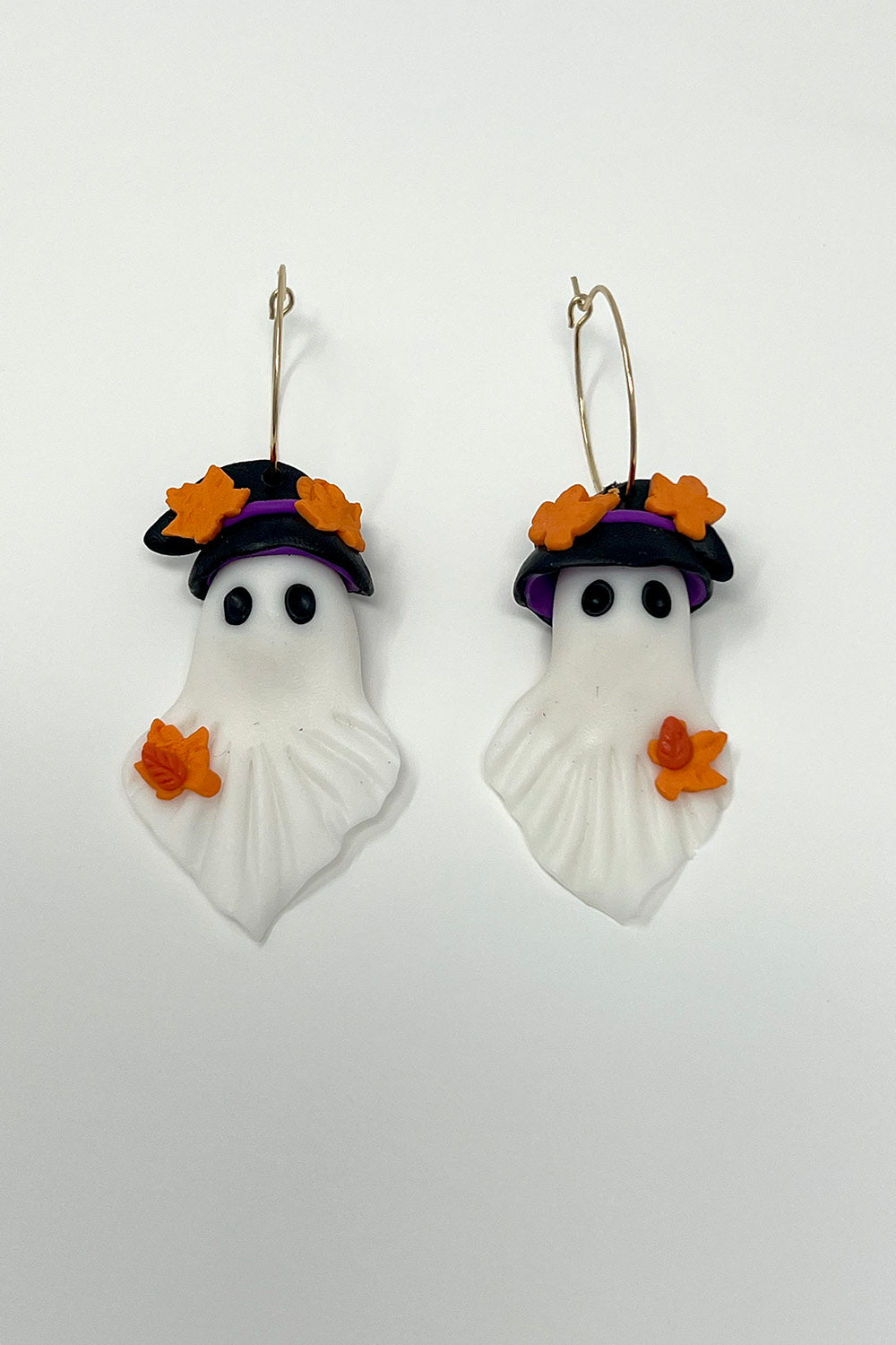 dark whimsical clay ghost earrings with gold hoops