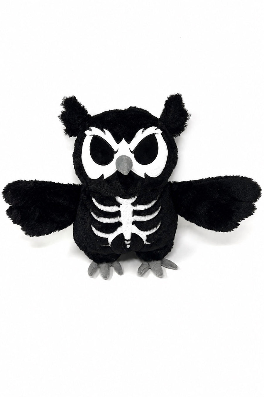 A black plush owl toy with a white skeleton print on its chest, large white eyes, and gray beak and feet, shown against a plain white background.