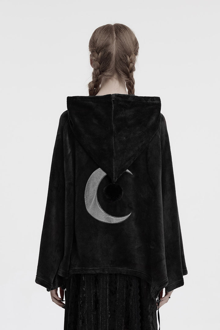 gothic woman wearing a black hooded cloak with a crescent moon symbol on the back against a white background