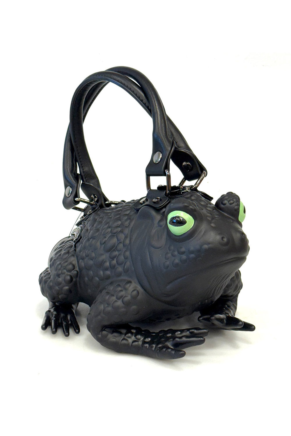 Black frog-shaped handbag with green eyes on a white background