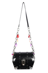 vegan leather black treasure chest bag from Foxblood with  pearl top handle and chain crossbody strap covered in gems