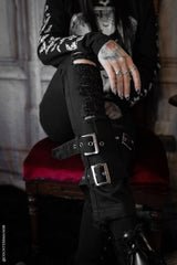 black denim buckled skinny jeans with shredding