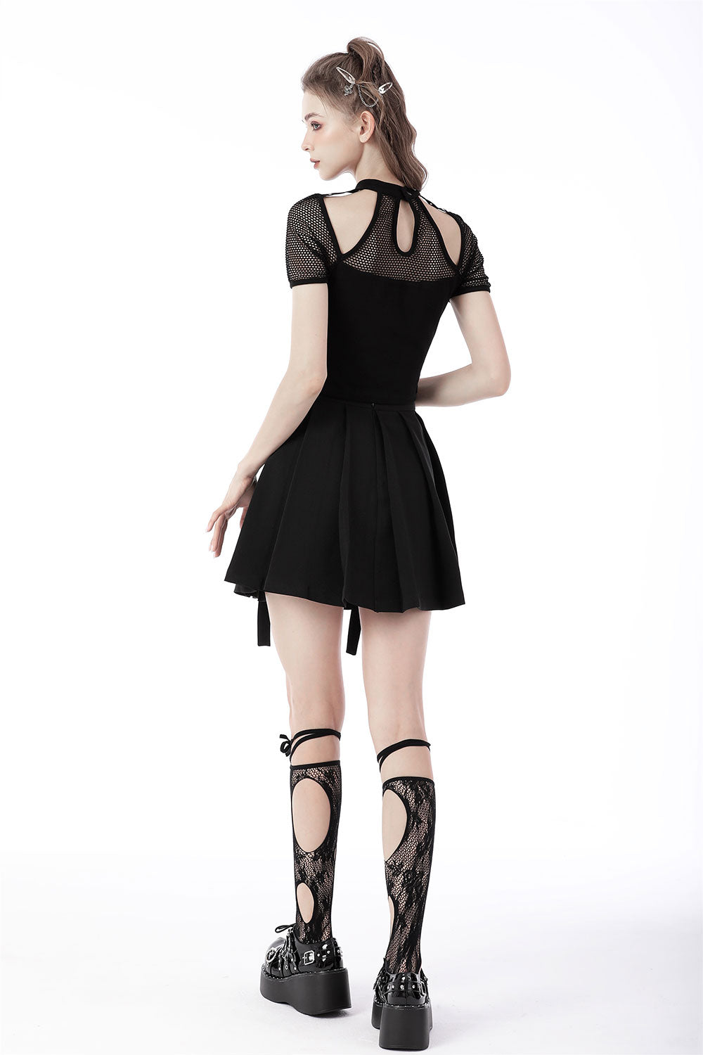 back view of model wearing Rocker sexy cutout net knit T-shirt from dark in love