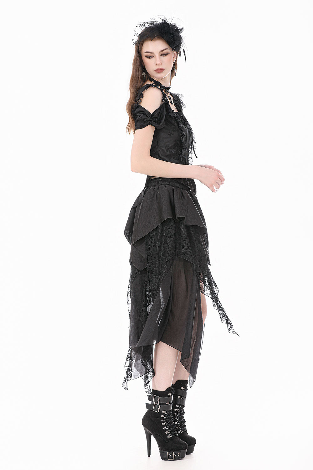 Side view of model wearing Dark IN Love cut out shoulder womens black top with lace