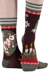 fun graphic socks in red and green with white goat and snowflakes