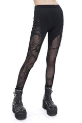 Leggings con aberturas y dijes victorianos